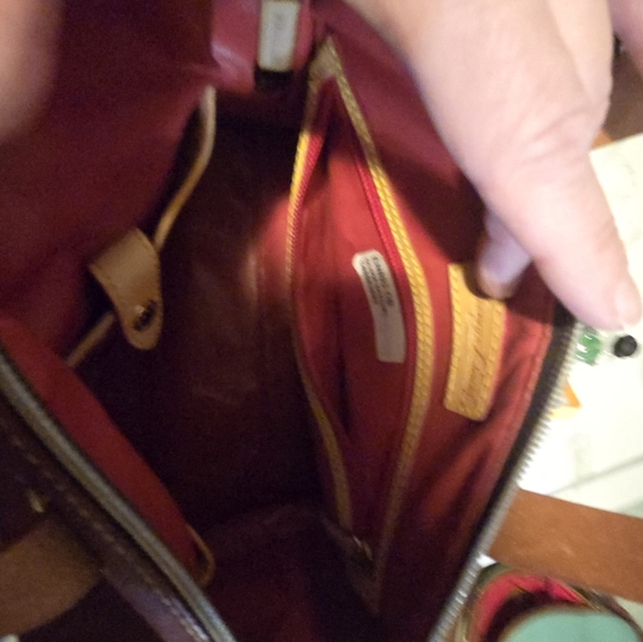 Dooney and Burke burgundy purse medium size. - Picture 4 of 5